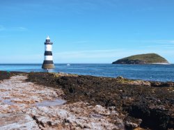 Penmon Point - Trwyn Du lighthouse and St Seiriol's Priory