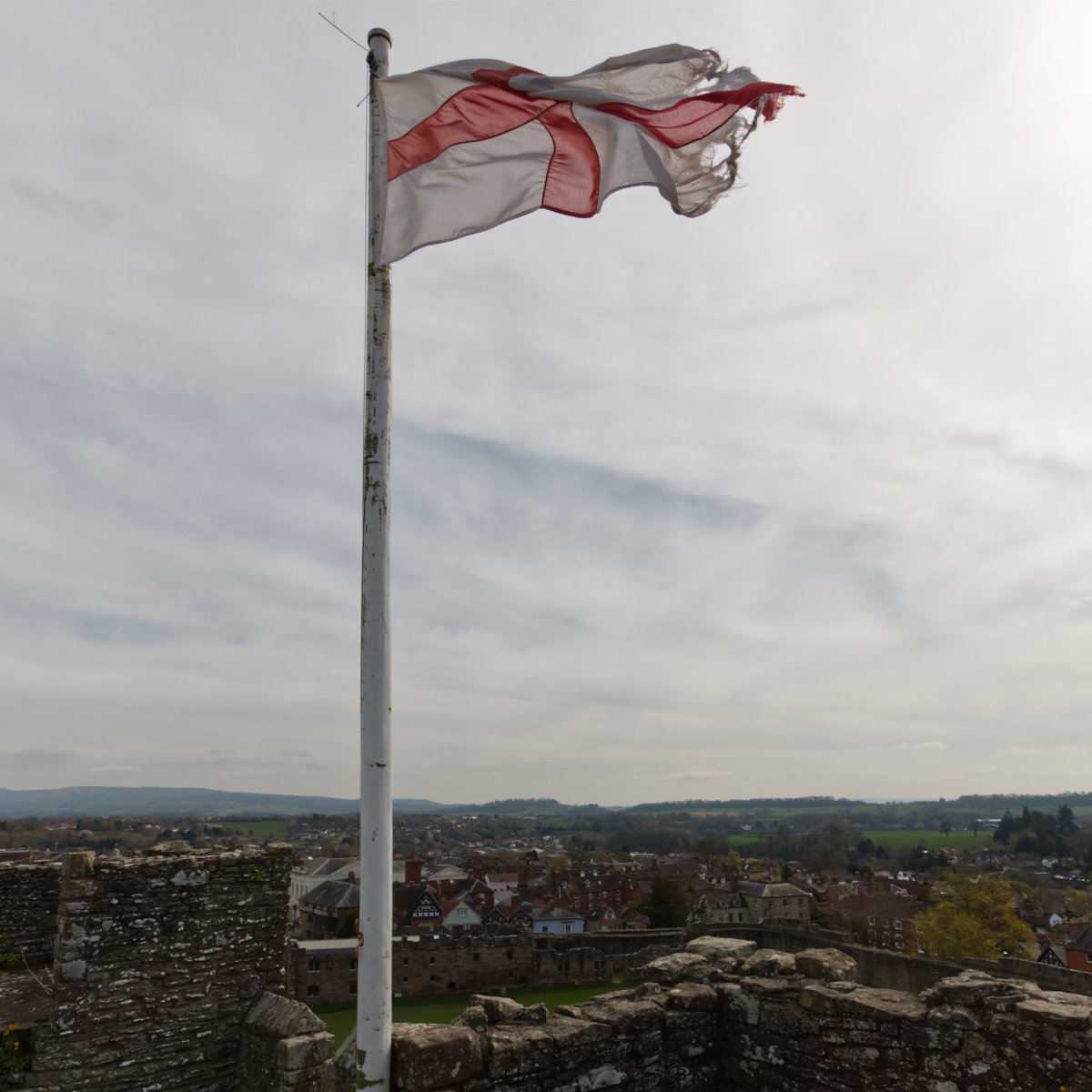 Tattered England flag flies over Ludlow town