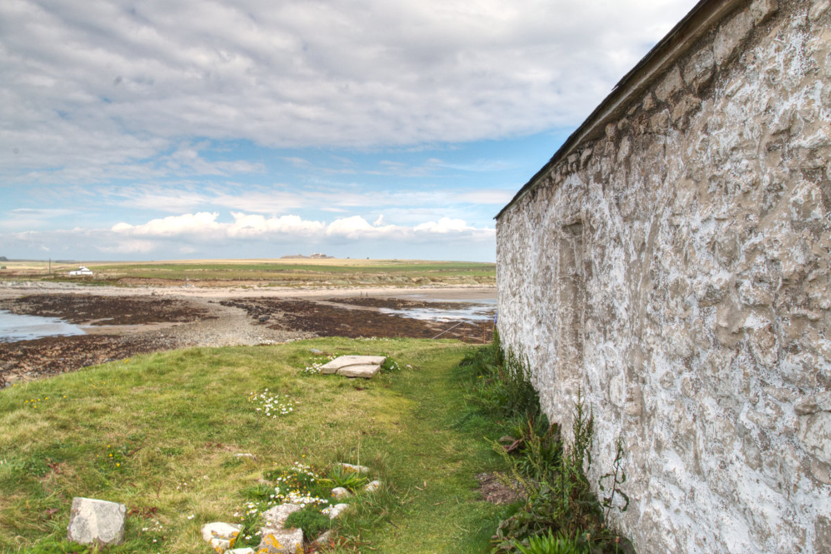 The view from Eglwys Cwyfan back over the causeway